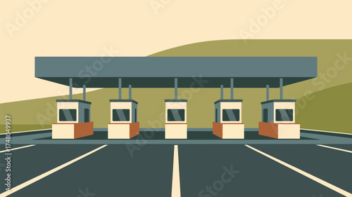 A highway toll booth with multiple lanes under a large canopy and a background hill landscape view