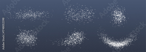 Salt or sugar powder particles scattered in white granular textures - different spill patterns on transparent background. Kitchen ingredient spills and cooking dust effects for culinary design.