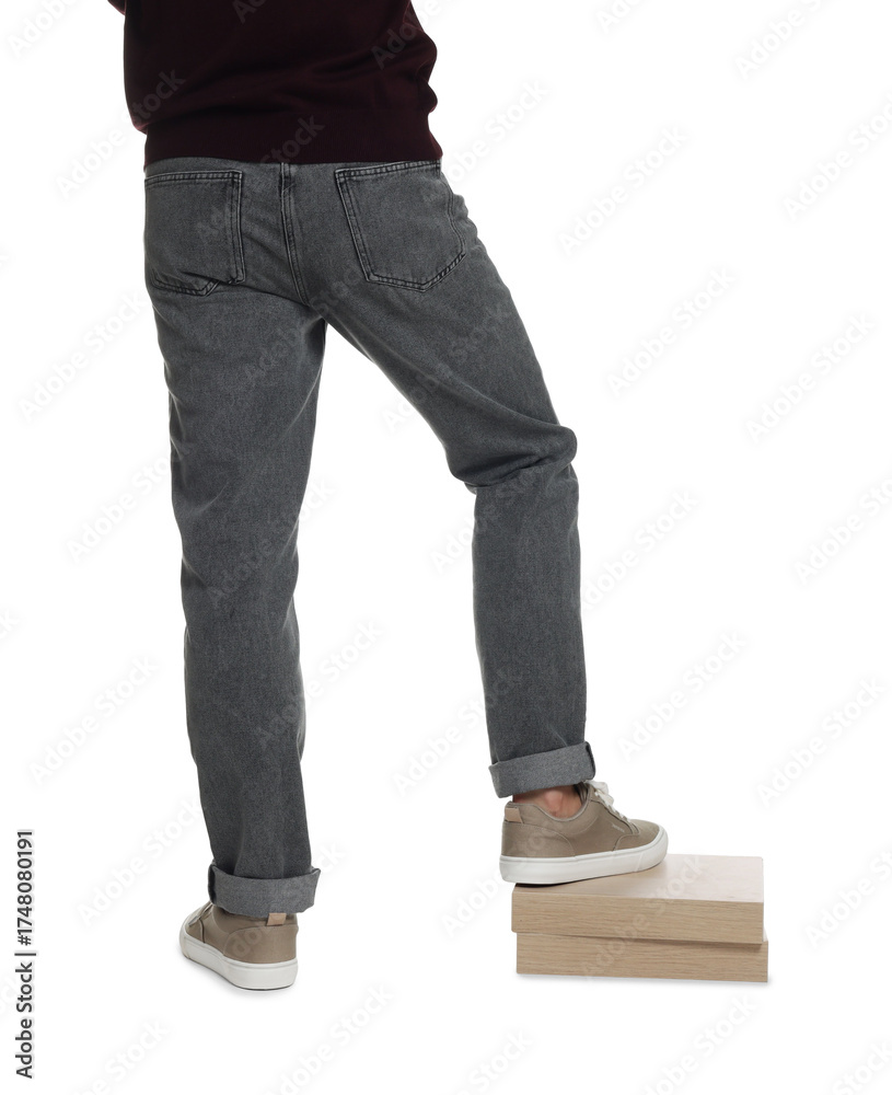 Naklejka premium Man in stylish jeans on white background, closeup