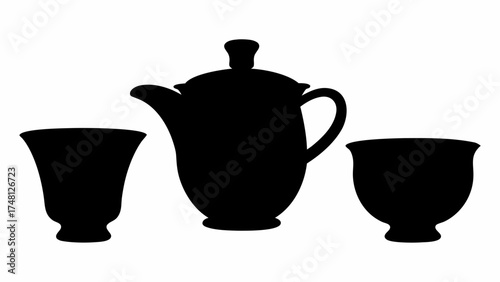 Elegant teapot with two cups, perfect for tea time, offering a classic silhouette and charm, ideal for minimalist designs and sophisticated projects