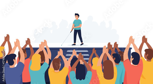 A visually impaired person on stage receiving applause from a diverse audience.