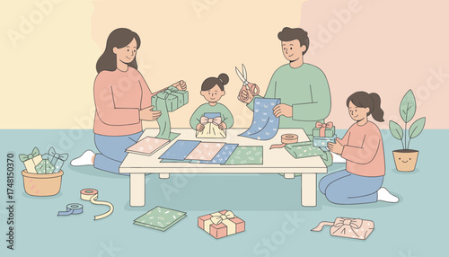 Happy family enjoying time together wrapping presents for a special occasion at home