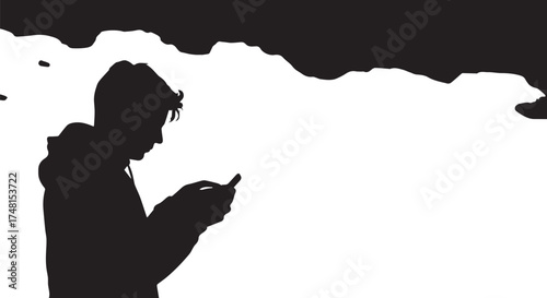 Silhouette of a young person engrossed in their smartphone, highlighting modern communication and digital interaction in everyday life