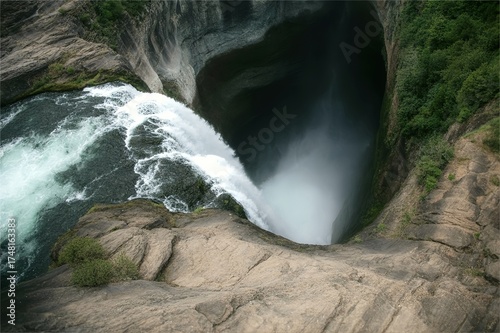 high waterfall pour down from above