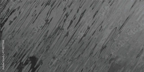 Abstract grayscale texture resembling rippling water or distressed metal with diagonal organic lines and dark tonal variations for artistic backgrounds