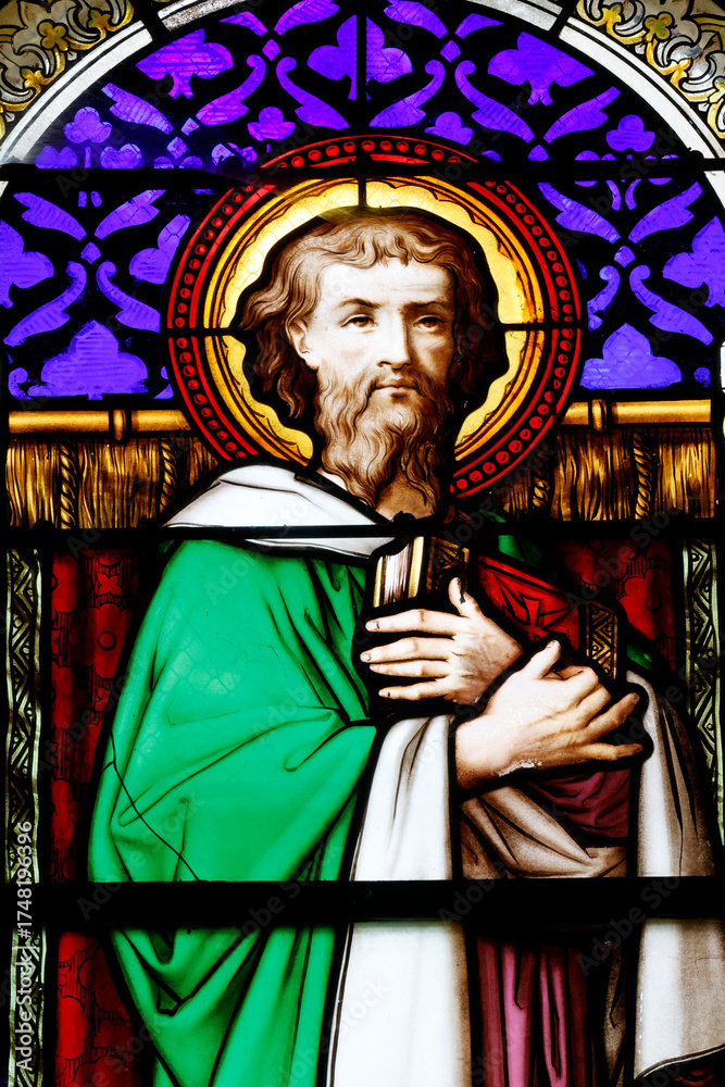 Fototapeta premium Church of Perrecy les Forges. Stained glass. Mark is associated with a lion, symbolizing courage and the voice crying out in the wilderness France.
