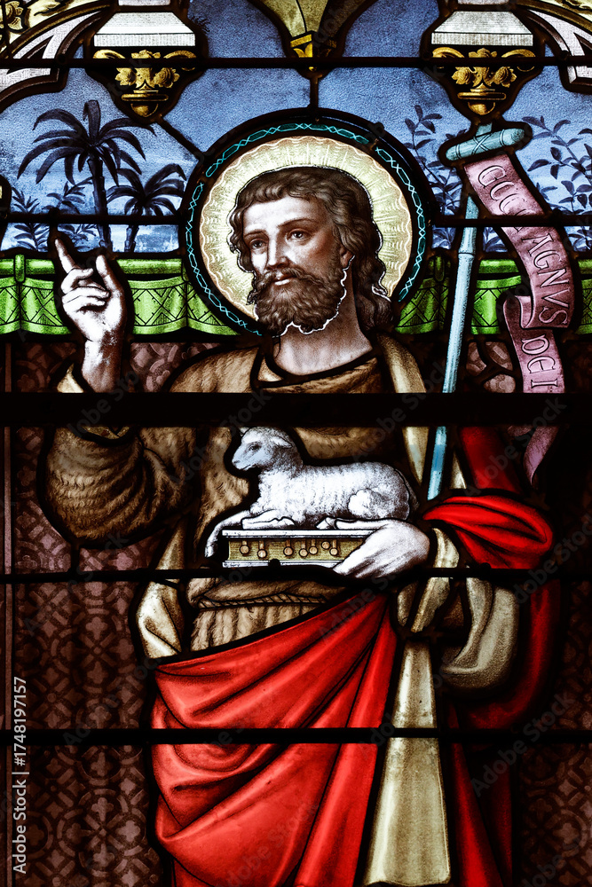 Fototapeta premium Saint Andew church. Stained glass. John the Baptist. Boege. France.