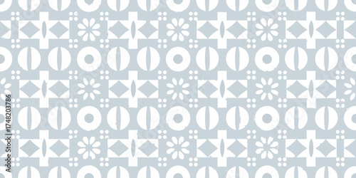 Geometric pattern with circles diamonds and floral motifs in white on a light blue background