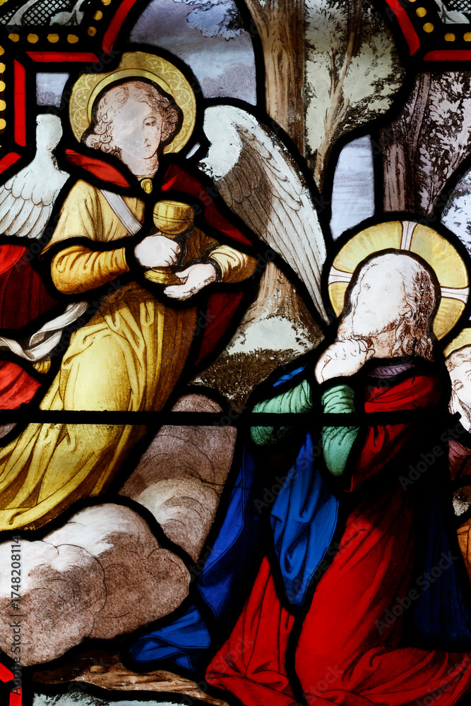 Obraz premium Church of the Cordeliers. Stained glass. Jesus praying in the garden of Gethsemane after the Last Supper. Lons le Saunier. France.