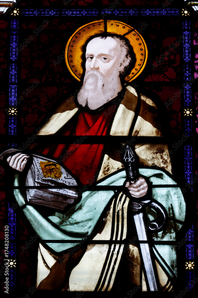 Obraz premium Church of the Cordeliers. Stained glass. Saint Paul the Apostle with a sword, symbolizing his martyrdom and the Word of God. Lons le Saunier. France.