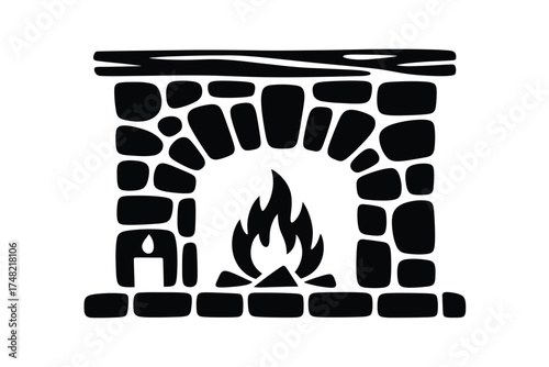 Rustic stone fireplace with a warm glowing fire and wood mantelpiece