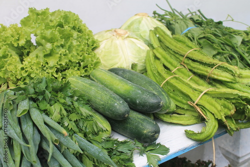 Assorted vegetables on wooden table
