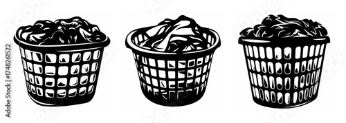 Three wicker laundry baskets filled with clothes ready for washing day