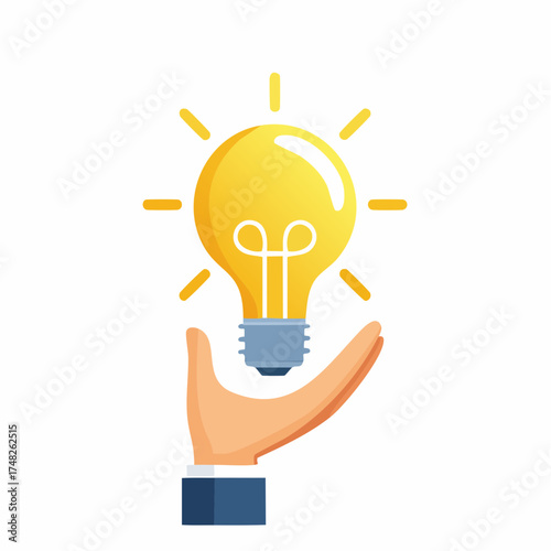 Hand holding a bright light bulb representing an innovative idea or solution