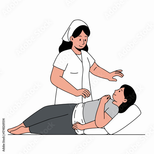 Healthcare professional attends to a patient lying down, offering gentle care or therapeutic assistance in a relaxed setting.