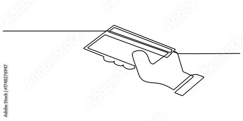 Hand holding a black and red bank card with chip, symbolizing luxury and secure financial continuous one line drawing