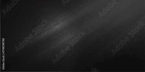 Stippled grain texture background. Black sprayed dots gradient wallpaper. Rough noisy sand dotted backdrop.