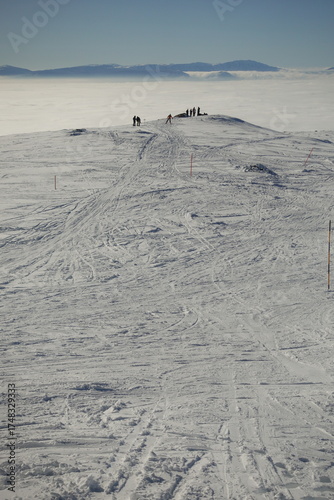 Winter landscapes of the old mountain. Stara Planina Ski Center in winter, ski slopes, clear blue sky above the snowy peaks of Stara Planina 