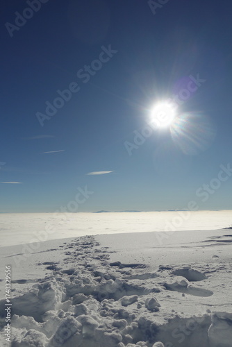 Winter landscapes of the old mountain. Stara Planina Ski Center in winter, ski slopes, clear blue sky above the snowy peaks of Stara Planina 