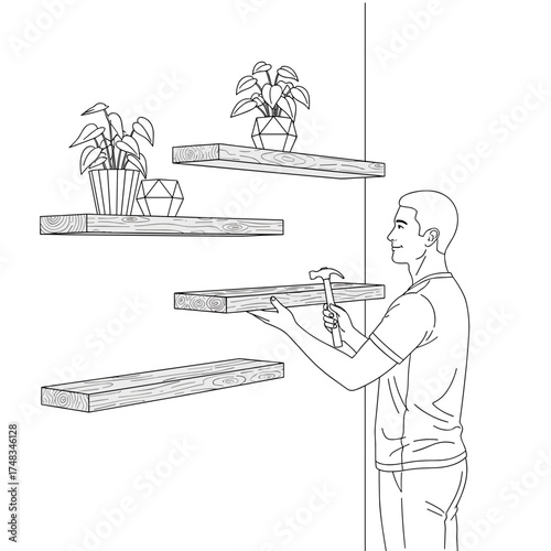 Man installing floating shelves with plants indoors