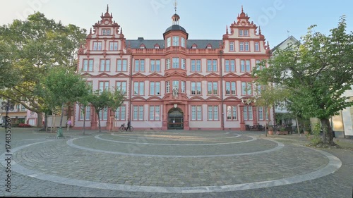 Exploring the historical architecture of Gutenberg Museum in Mainz during a sunny day