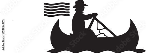 Silhouetted person paddles canoe with striped flag at the stern outdoors adventure