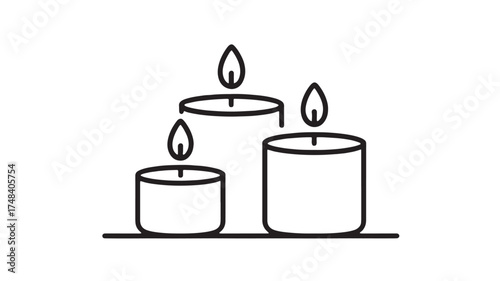 Three glowing candles on a dark background, creating a warm and peaceful atmosphere.