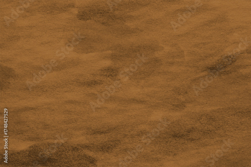 Detailed close-up of a warm, earthy brown textured surface, perfect as a natural abstract background for design projects. Soft, grainy pattern with subtle gradients