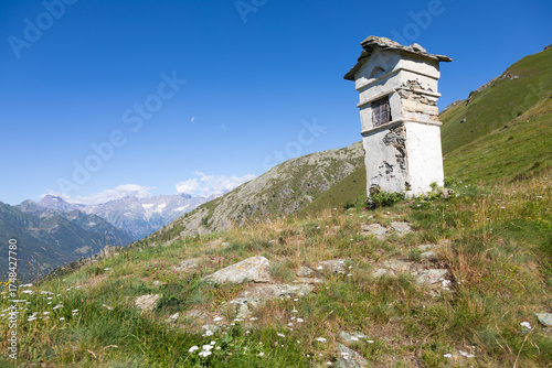 Panorama of Italian Alps with blue sky and cloud. Calm landscape, tranquil scenic view.