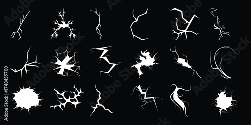 Collection of White Cracks and Fractures on a Black Background