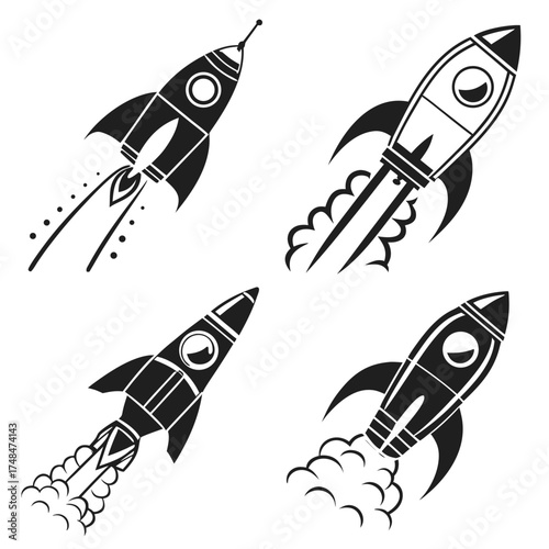 Four black silhouette rocket designs with exhaust trails
