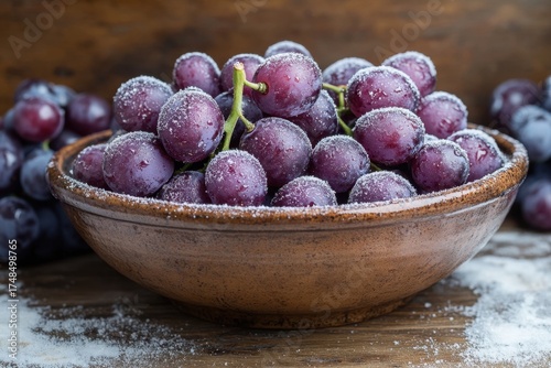 Grapes in bowl dusted with sugar.