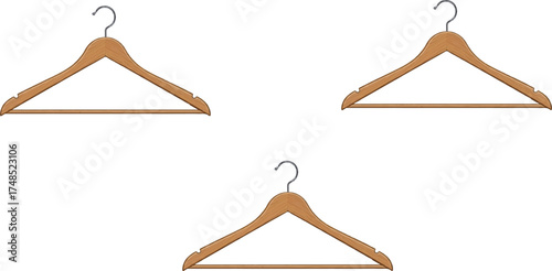 this trio of wooden hangers feels like a quiet symphony of form and function.