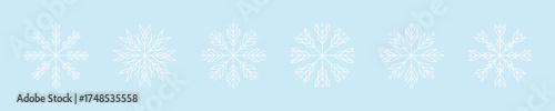 Elegant snowflake pattern on light blue background for winter decor