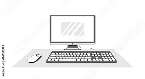 Computer workstation setup with monitor keyboard and mouse on a desk.