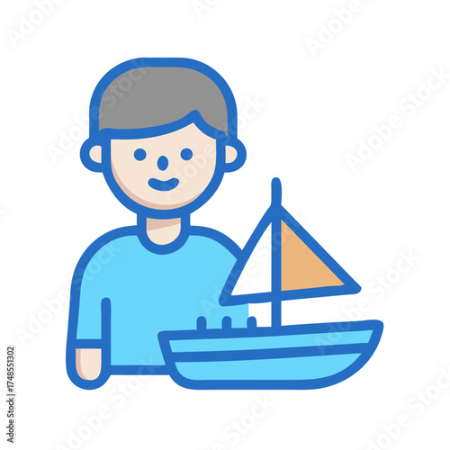 Boy holding a toy sailboat with blue and beige
