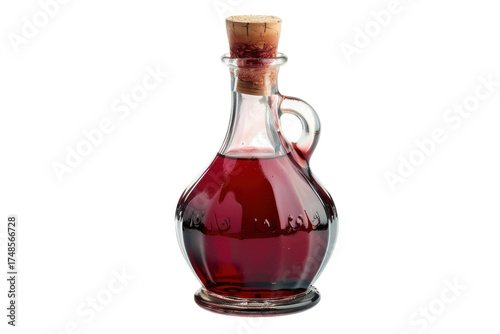 Artisanal glass bottle filled with rich red liquid sitting elegantly on a clean white surface isolated on transparent background