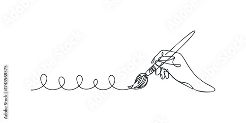 Hand with paintbrush creating wavy line