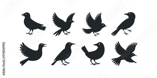 Collection of eight dark bird silhouettes in various poses