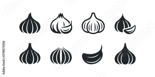 Set of Black Icons Representing Garlic Cloves and Bulbs