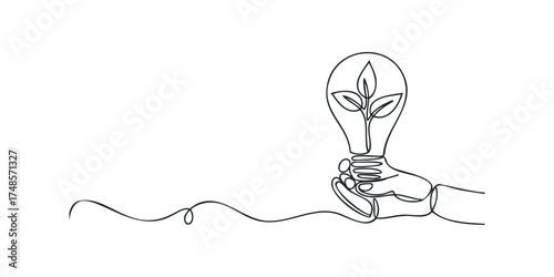 Hand holding light bulb with plant growing inside
