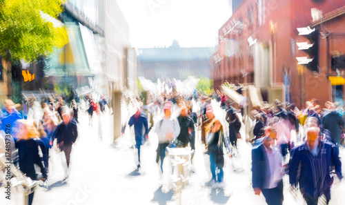 Motion blur of  people walking in the City of London at sunny day.