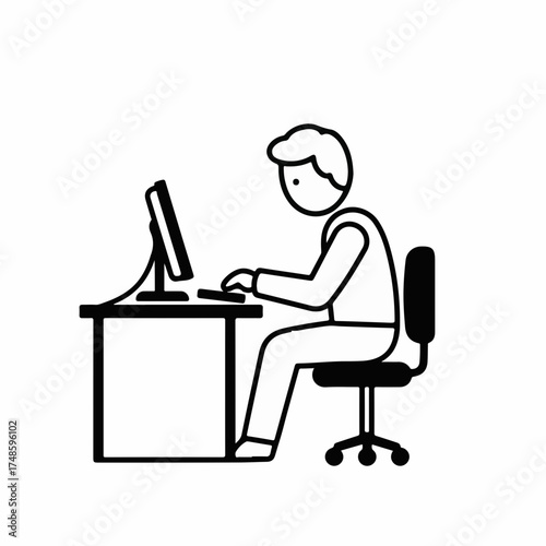 Focused individual working diligently on a computer at a desk, symbolizing productivity and remote work.