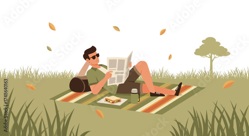 Relaxed Man On Picnic Reads Newspaper During Pleasant Autumnal Afternoon Outdoors