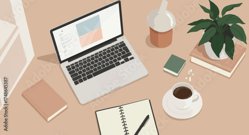 Workspace setup with laptop, coffee, and books, promoting productivity and relaxation for remote work or study