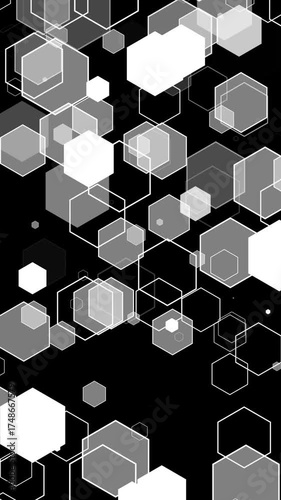 Black And White Design Loop. Geometric pattern of white hexagons falling on a black background, seamless loop, vertical resolution.
