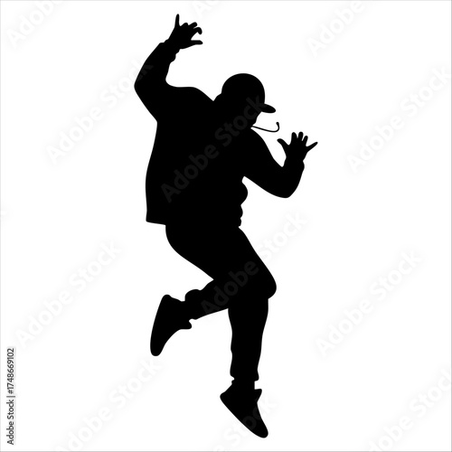 Silhouette of a man dancing, full body, jumping. Capturing a dynamic, energetic moment.