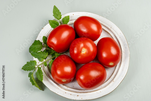 Red ripe roma tomatoes used for pasta sauce or tomatpes sauce in Italian cuisine