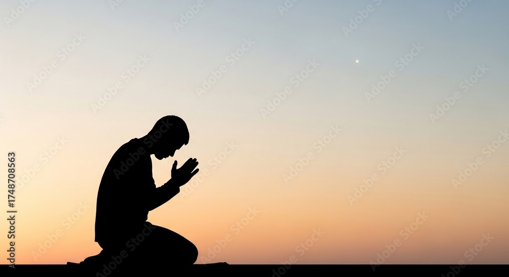 Fototapeta premium Prayer Silhouette: An individual, silhouetted against a serene twilight sky, kneels in prayer, embodying introspection and spirituality. 