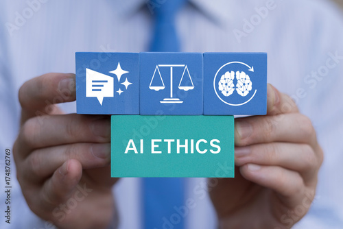 AI ethics and responsible artificial intelligence governance concept. Man holding blocks with icons sees the words AI ETHICS. Fair, safe, legal use of technology. Machine learning morality, principles